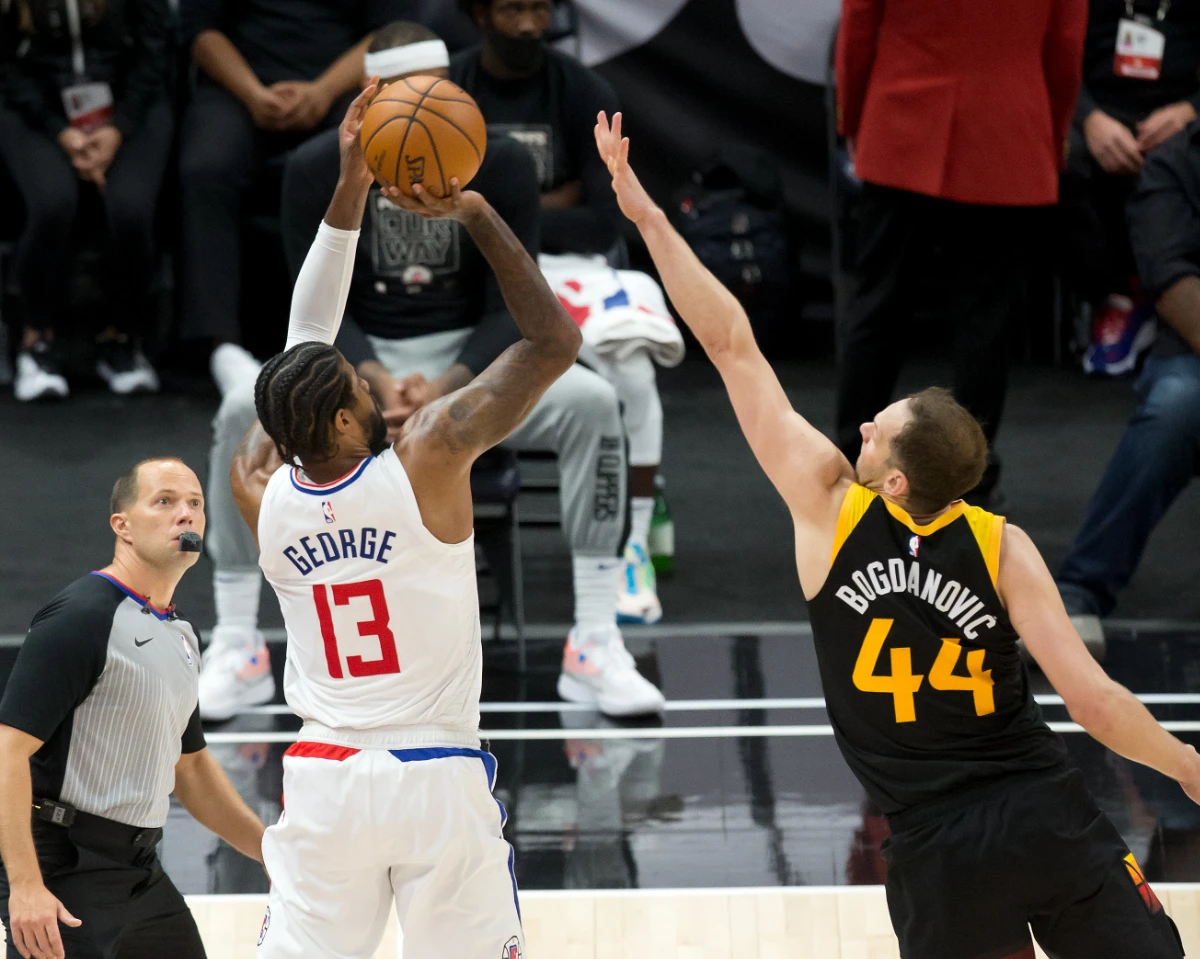 LA Clippers guard Paul George shoots against Utah Jazz forward Bojan Bogdanovic. (Russell Isabella-USA TODAY Sports)