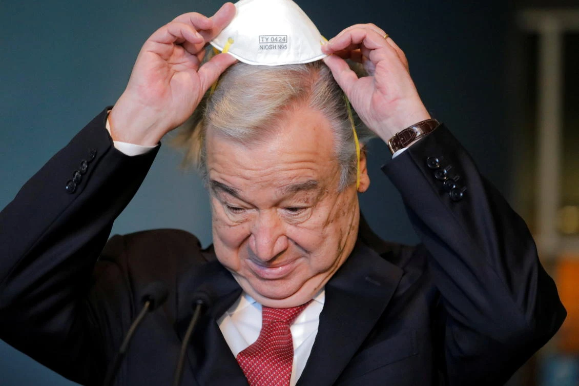UN Secretary-General Antonio Guterres puts on a face mask after addressing the media as UN General Assembly appointed him for a second five-year term in New York City. (Reuters)