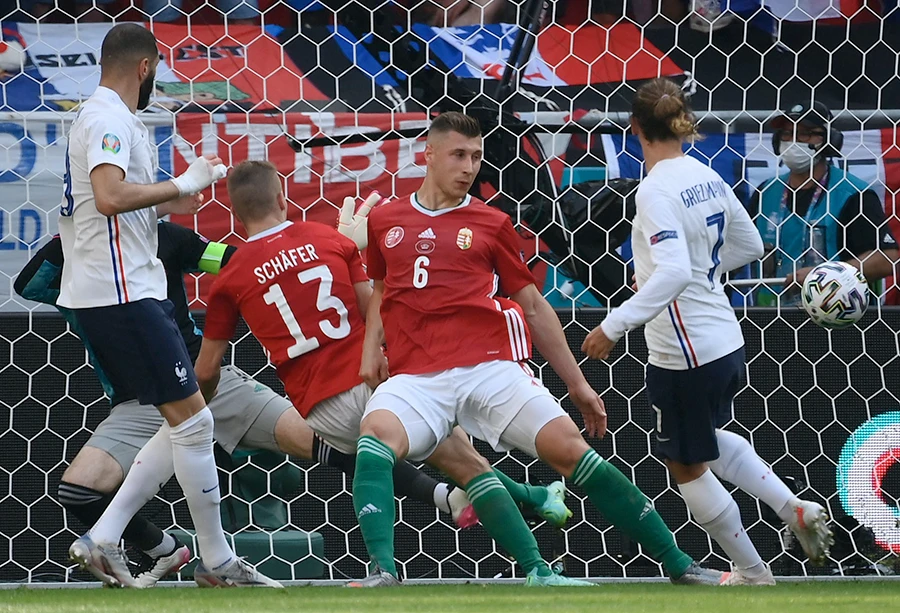 France’s forward Antoine Griezmann scores his team’s first goal during Friday’s Euro 2020 Group F match against Hungary in Budapest. (AFP)