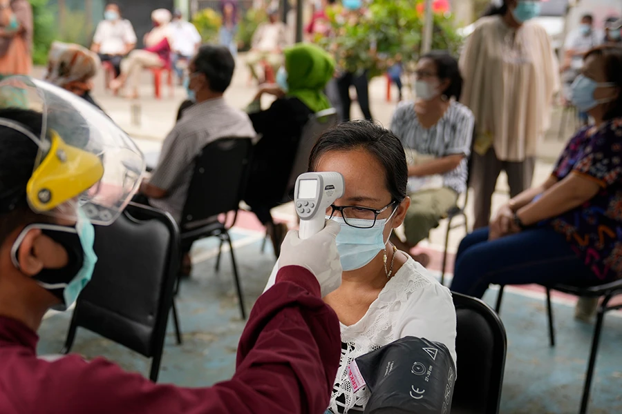 Indonesians call for tighter curbs after 500% surge in COVID-19 cases