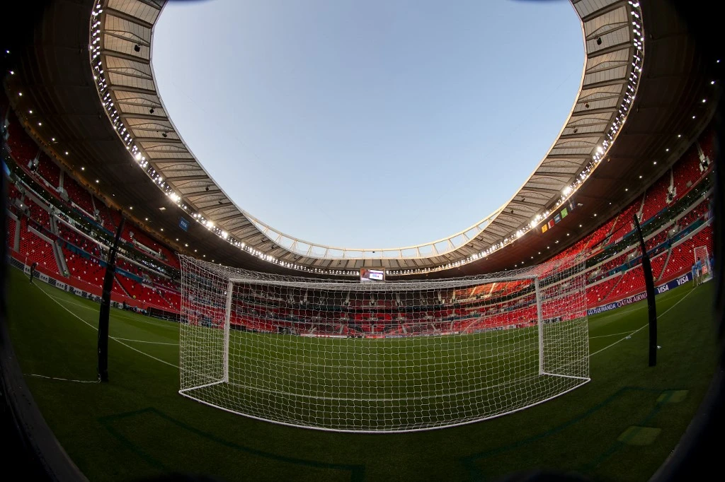 Above, the Ahmed bin Ali Stadium in the Qatari city of Ar-Rayyan. Qatar has the stadiums and the know-how and, crucially, is not involved in the 2022 World Cup qualification. (AFP)