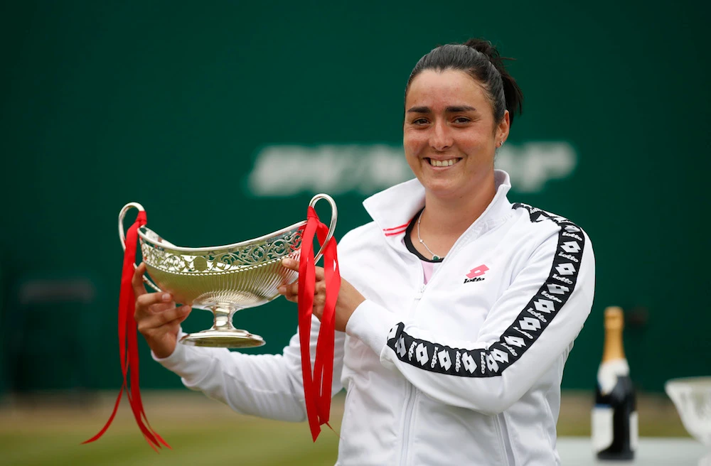 Tunisia's Ons Jabeur celebrates with the trophy after winning her final match against Russia's Daria Kasatkina. (Action Images via Reuters)