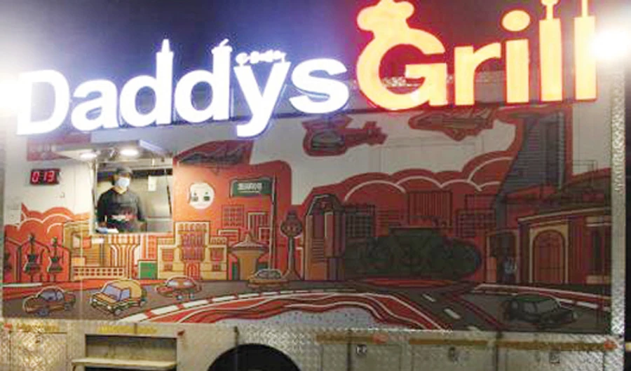 During the COVID-19 crisis, the owner of Daddy’s Grill food truck decided to seize the opportunity by expanding into new neighborhoods. (Supplied)