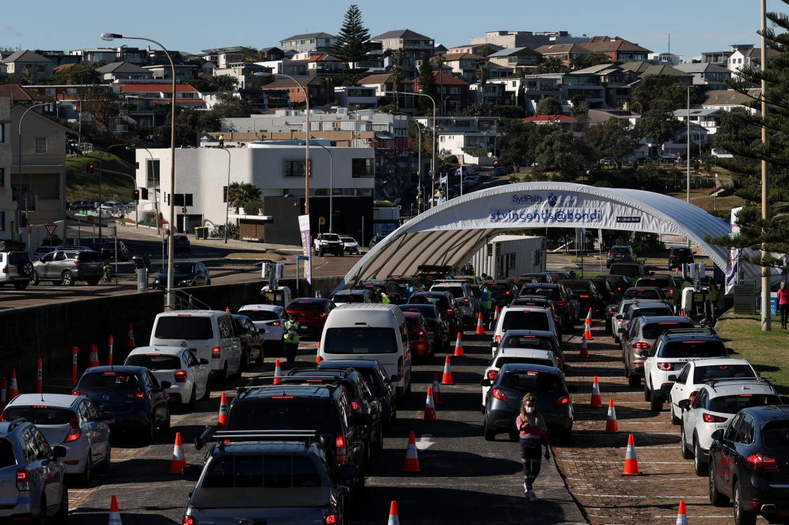 New South Wales reported its biggest rise in new locally acquired COVID-19 cases in nearly a week, prompting authorities to extend a mask mandate in Sydney for a week. (Reuters)