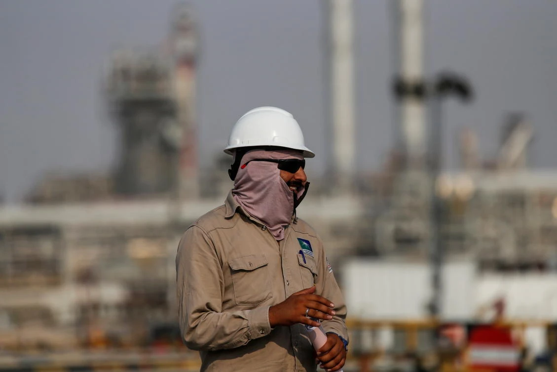 An employee looks on at Saudi Aramco oil facility in Abqaiq. (Reuters)