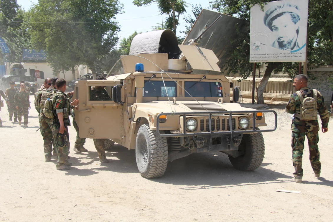 Fear stalks northern Afghan city as Taliban lay siege