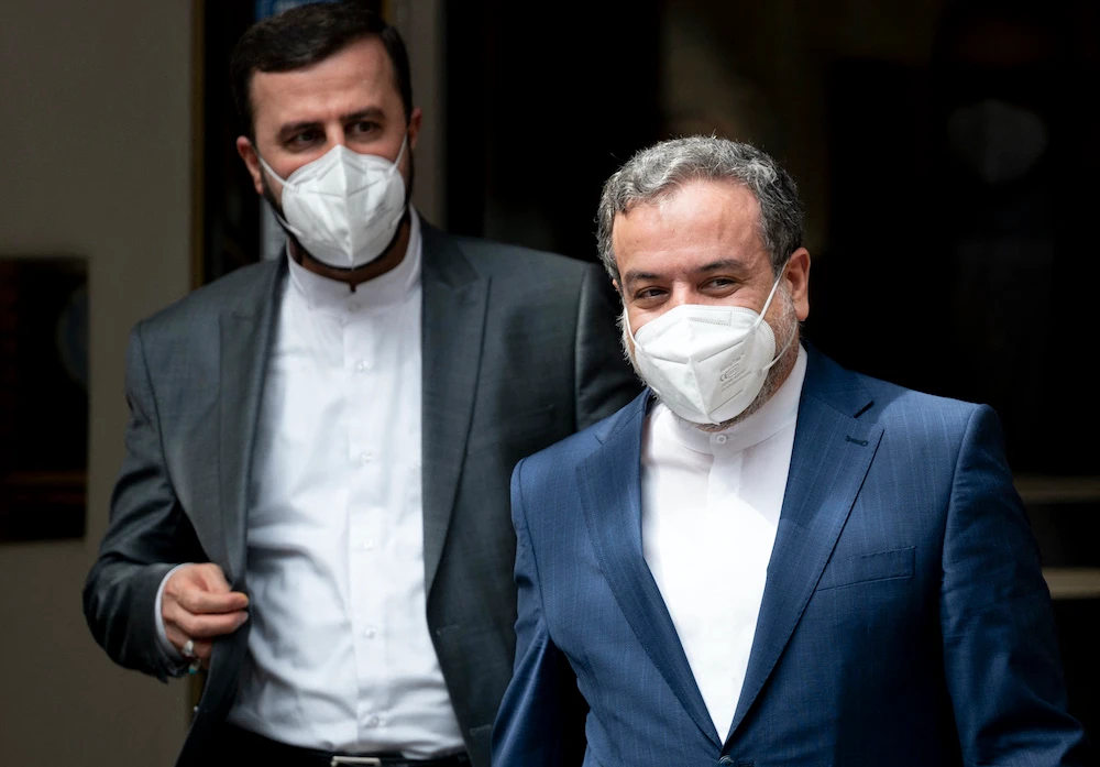 Abbas Araghchi (R), political deputy at Iran’s Foreign Ministry, and Iran’s Governor to the International Atomic Energy Agency, Kazem Gharib Abadi are leaving the ‘Grand Hotel Wien’ after the closed-door nuclear talks in Vienna. (File/AFP)
