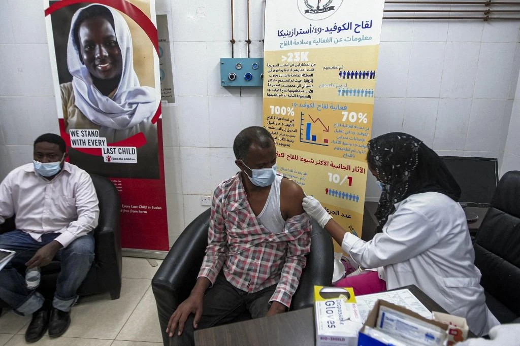 Above, patient receives a dose of the Oxford-AstraZeneca COVID-19 vaccine in Sudan’s capital Khartoum on March 9, 2021. (AFP)
