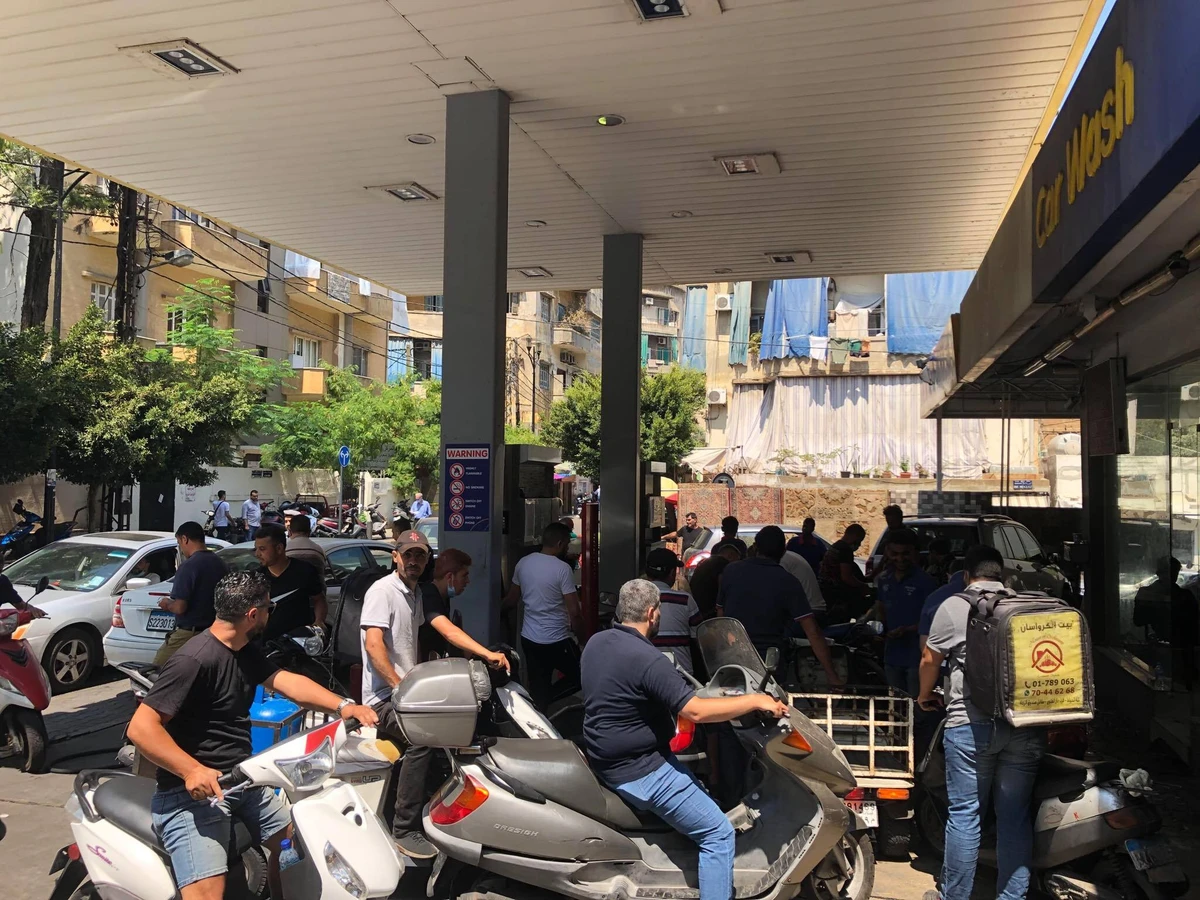Long queues outside gas stations have sparked brawls, traffic jams, accidents on nearby roads and even gunfights as Lebanon's crisis deepens. (AN Photo/Bassam Zaazaa)