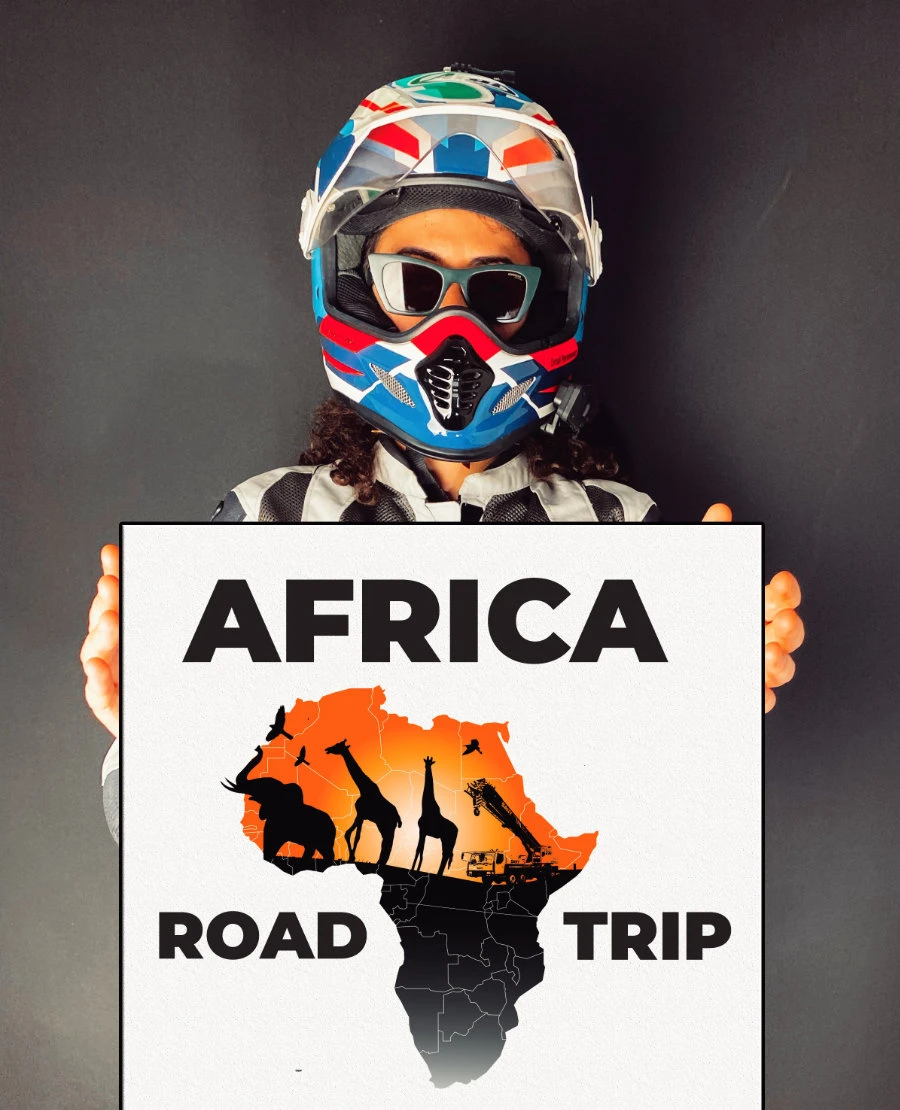 Asil Ozbay pose for a picture signaling the start of his tour of the African continent. (Supplied)