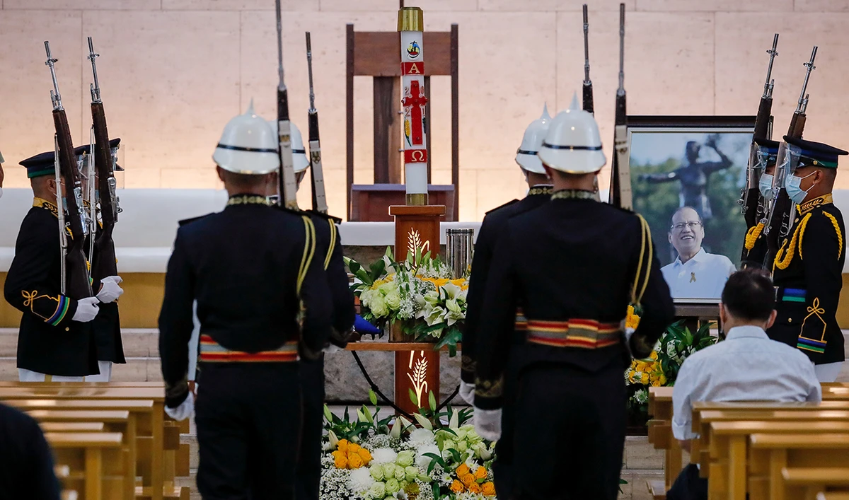 Military honor guards prepare to change shifts during a public viewing of former Philippine President Benigno Aquino on Friday at the Church of Gesu, Ateneo de Manila University in Quezon City. (Reuters)
