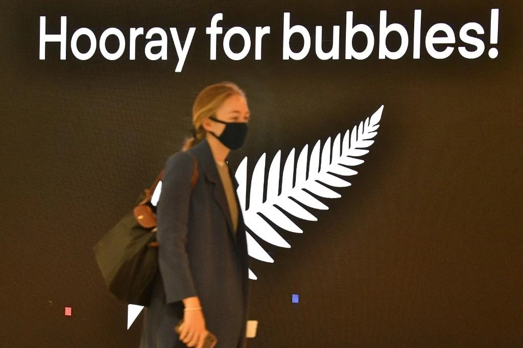 Above, a traveller departs for New Zealand at Sydney International Airport on April 19, 2021. (AFP)