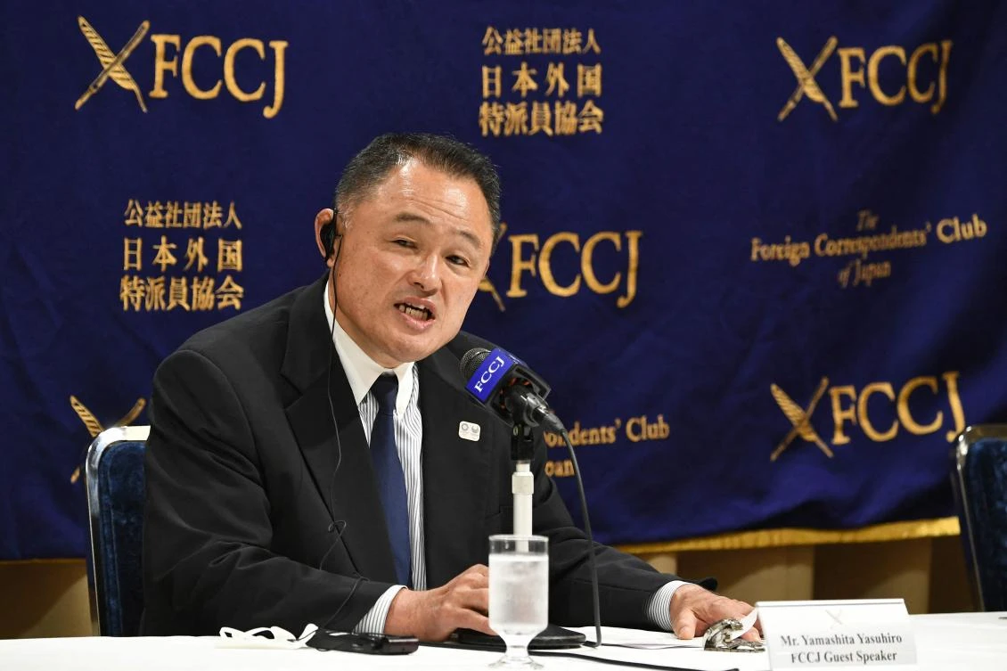 Yasuhiro Yamashita, President of the Japanese Olympic Committee, speaks during a press conference at the Foreign Correspondents’ Club of Japan in Tokyo on June 28, 2021. (AFP)