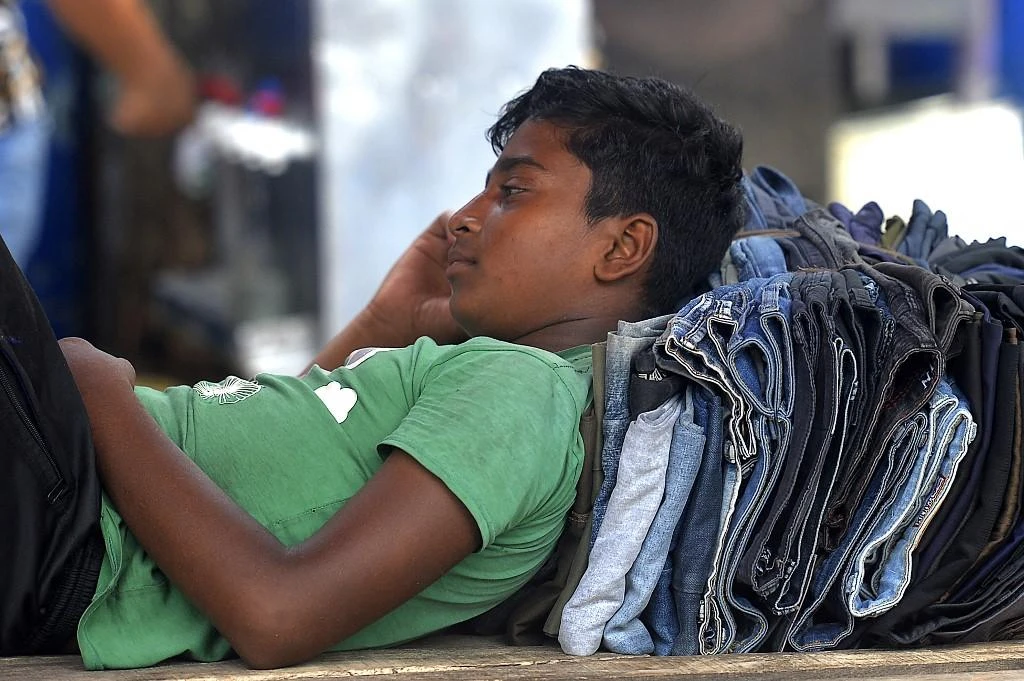 Restrictions on activities and movement were imposed across Bangladesh in mid-April as cases and deaths jumped to their highest levels since the start of the pandemic. (AFP)
