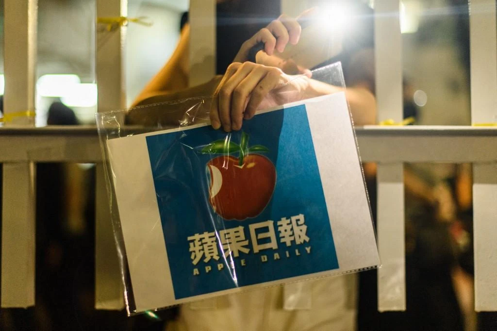 Hong Kong police arrest former Apple Daily journalist at airport