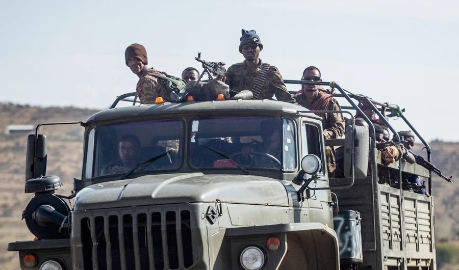 In this Saturday, May 8, 2021 file photo, Ethiopian government soldiers ride in the back of a truck on a road near Agula, north of Mekele, in the Tigray region of northern Ethiopia. (AP)