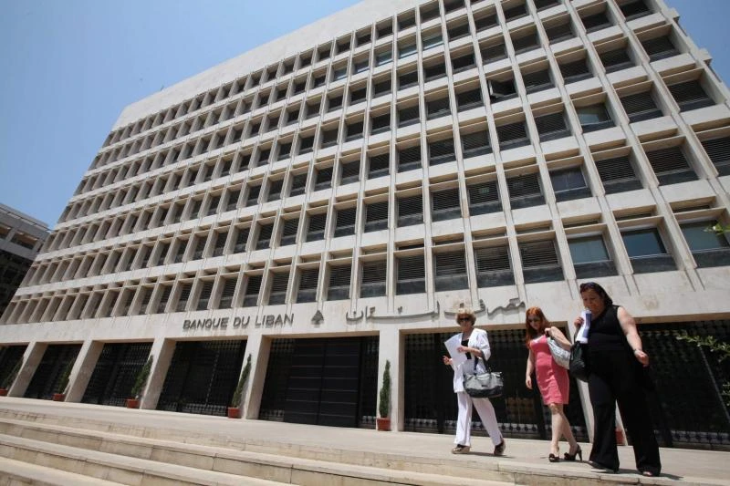 The Lebanese Swiss Bank said it would close after a hundred men barged into the headquarters and assaulted its employees