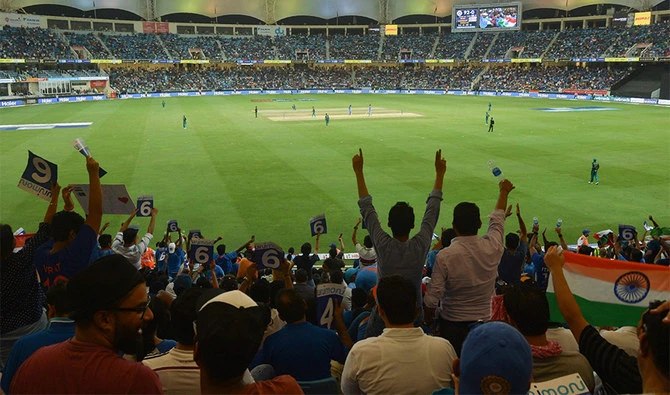 Cricket fans cheer in support of their national team during the one day international Asia Cup cricket match against Pakistan at the Dubai International Cricket Stadium in Dubai on September 19, 2018. (AFP/File)