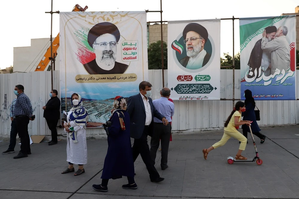 Banners depicting presidential candidate Ebrahim Raisi in Tehran, Iran, June 14, 2021. (Reuters)