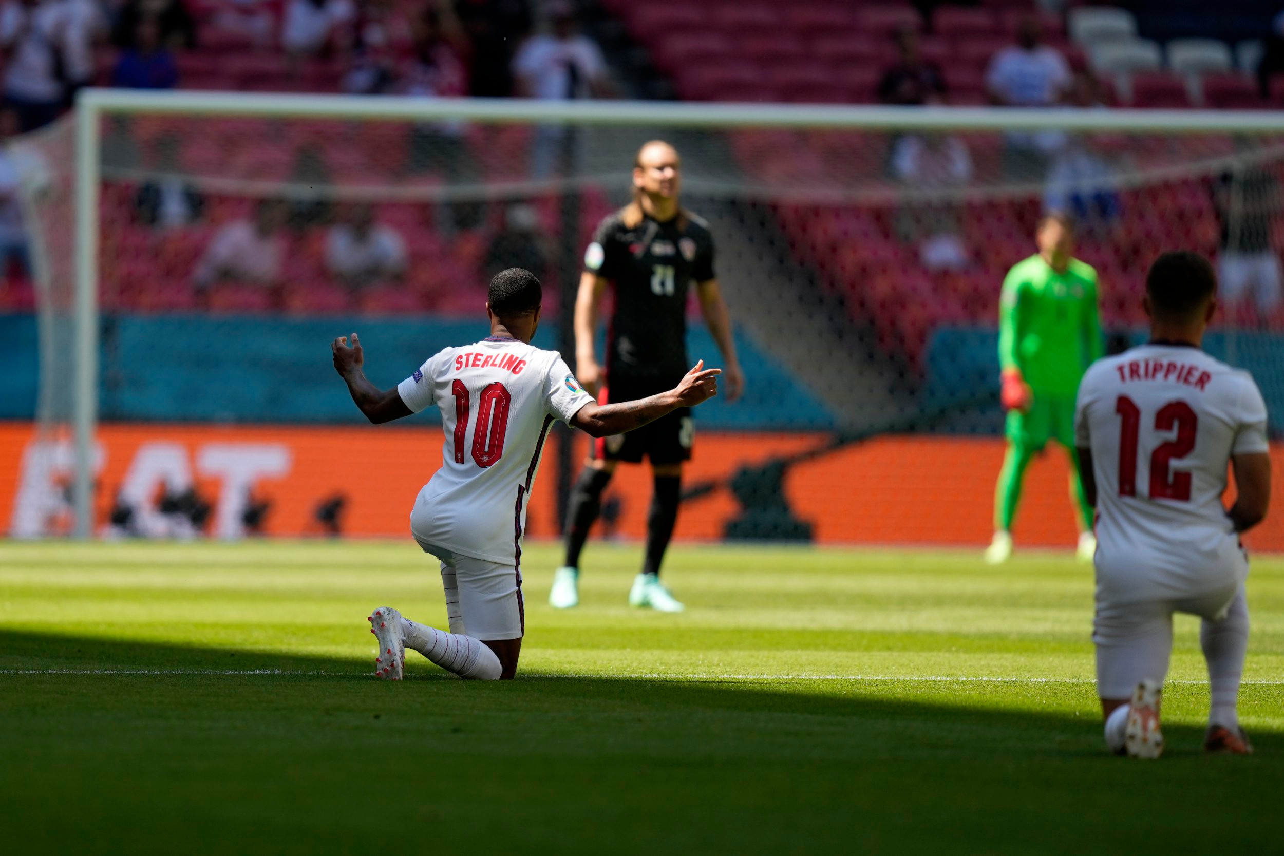 England’s players take the knee before the start of their Euro 2020 opener against Croatia. (AP Photo)