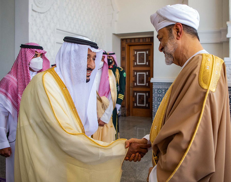 Saudi King Salman bin Abdulaziz (L) receiving Oman's Sultan Haitham bin Tariq at the airport in Neom, an area in the north-west of the Kingdom. (AFP)