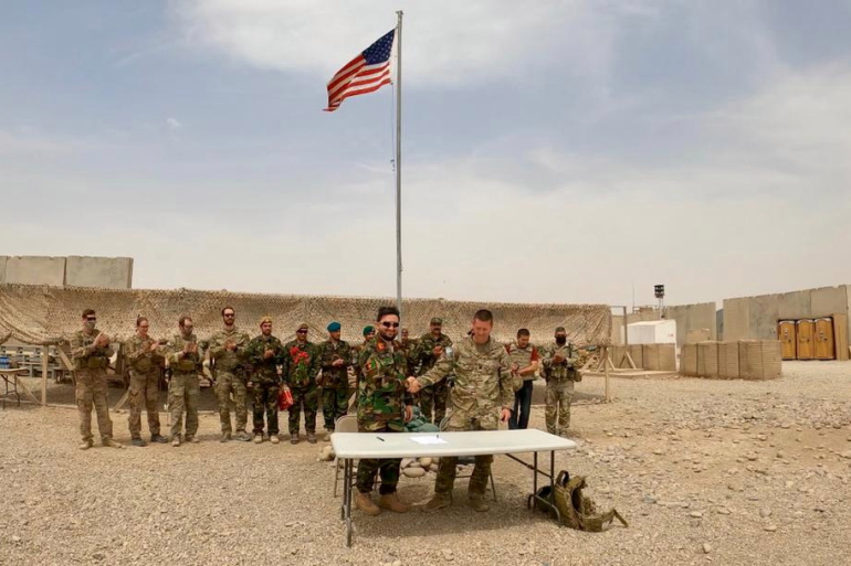 The handover ceremony at Camp Anthonic, from US Army to Afghan Defense Forces, Helmand province, Afghanistan, May 2021. (Reuters)
