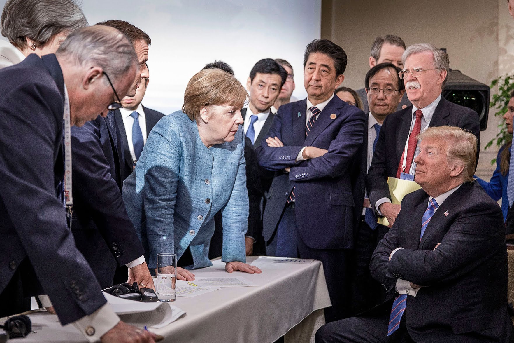 Germany Chancellor Angela Merkel confronting Donald Trump at a G-7 meeting in 2018, in a photo that quickly went viral. (Shutterstock)