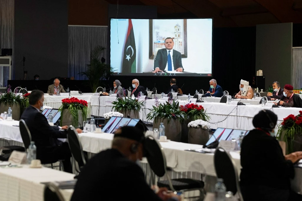 Abdul Hamid Mohammed Dbeibah delivers a speech via video link during a meeting of the Libyan Political Dialogue Forum (LPDF). (File/AFP)