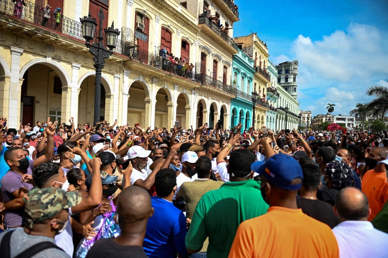 Protesters take part in a demonstration against the government of President Miguel Diaz-Canel in Havana, Cuba, July 11, 2021. (AFP)