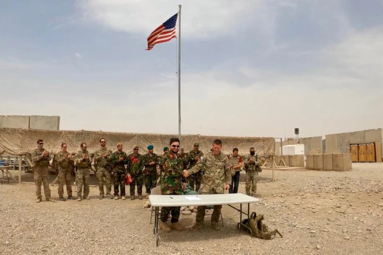 The handover ceremony at Camp Anthonic, from US Army to Afghan Defense Forces, Helmand province, Afghanistan, May 2021. (Reuters)