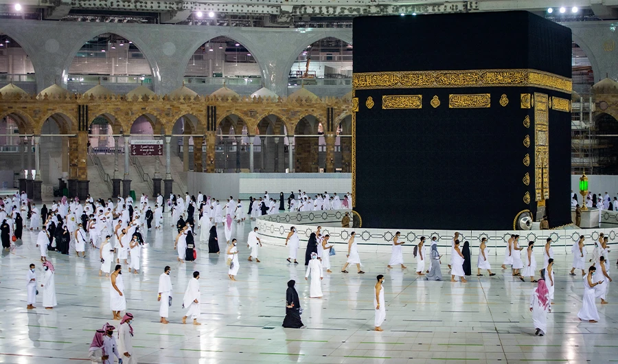 A handout picture provided by the Saudi Ministry of Hajj and Umrah on October 4, 2020, shows pilgrims circumambulating the Kaaba in the Grand Mosque complex in the holy city of Mecca. (AFP/File)