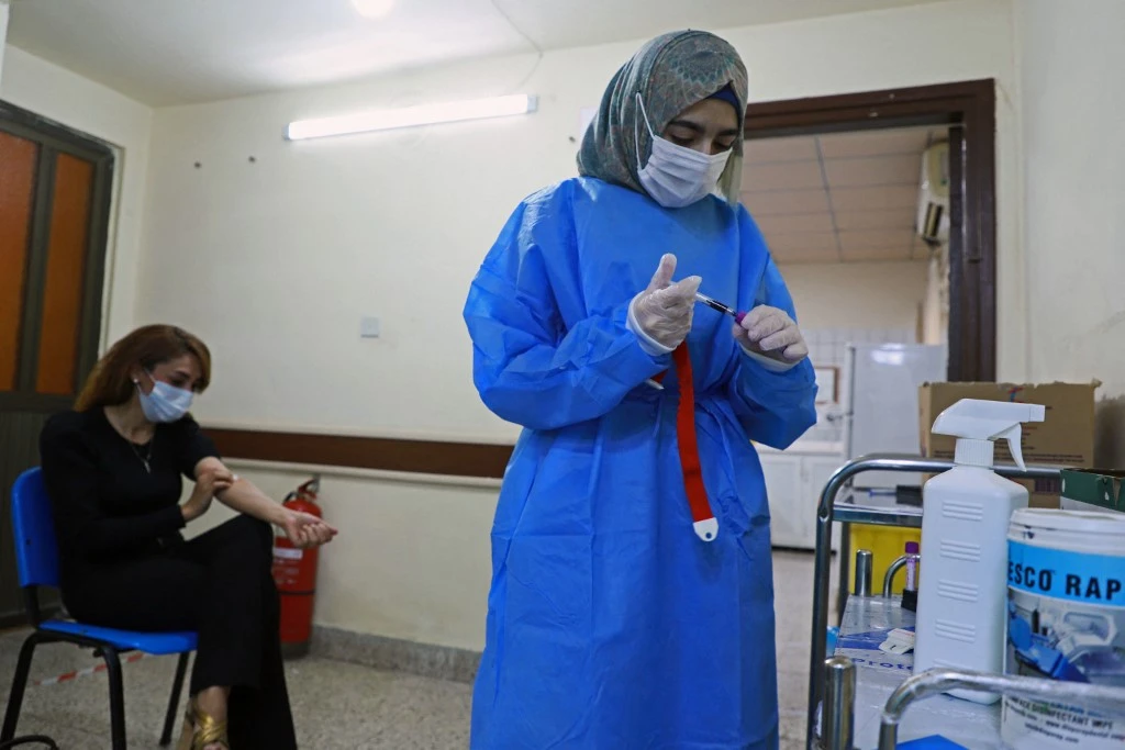 So far, the Kurdish authority has administered 160,000 doses of vaccines against COVID-19. (File/AFP)