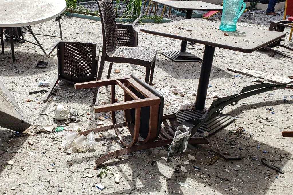 Al-Shabab regularly attacks government and civilian targets in Mogadishu. Above, damage at the popular Medina hotel of Kismayo on July 13, 2019 after a suicide attack by Al-Shabab militants. (AFP file photo)