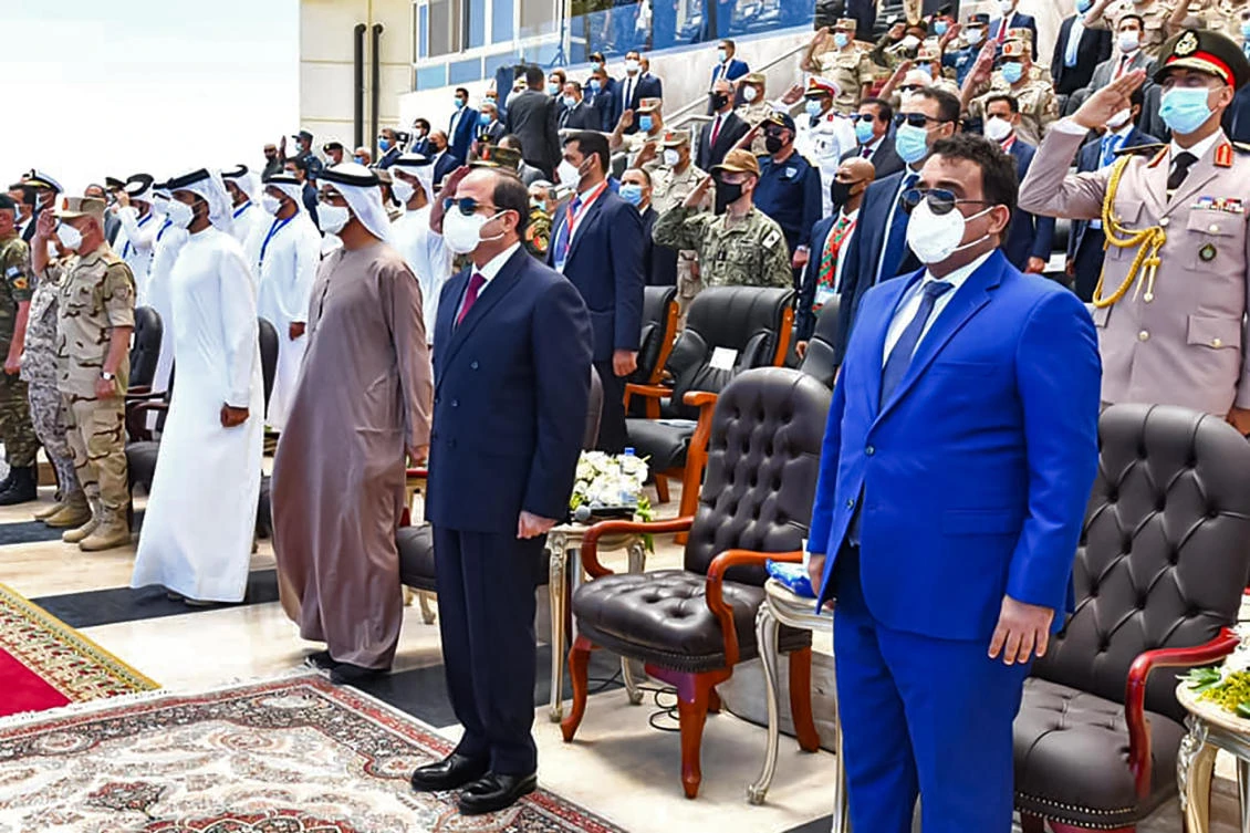 El-Sisi, accompanied by Sheikh Mohammed bin Zayed Al-Nahyan and Libya's Presidential Council president Mohamed Al-Menfi, attends the inauguration of the naval base in Gargoub. (AFP)