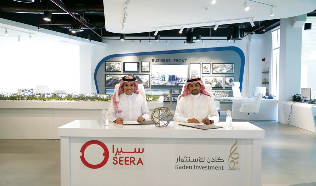 Majed Alnefaie, CEO of Seera Group, and Abdullah Al-Fassam, CEO of Kaden Investment, at the signing ceremony for the joint venture agreement.