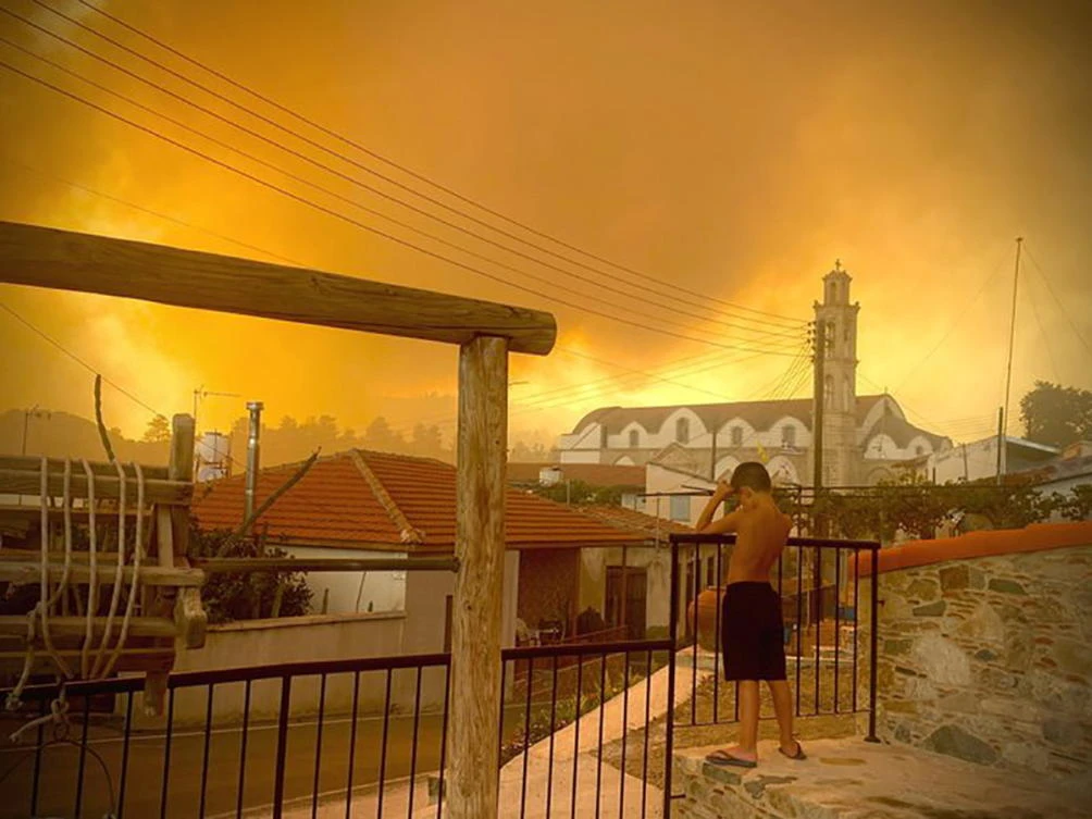 The cause of the fire, which started around midday on Saturday, was unclear. Above, smoke from a forest fire is seen in Ora village, Larnaca, Cyprus. (Andrea Anastasiou via Reuters)