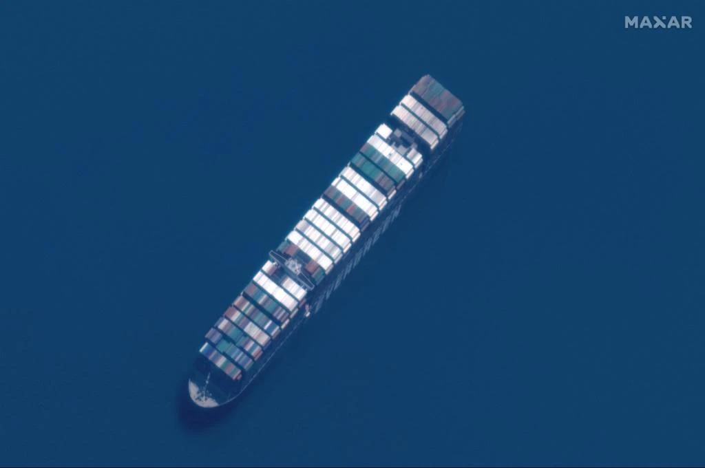 Suez Canal says deal reached to free seized vessel