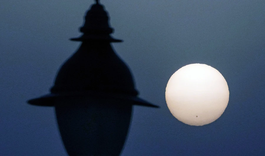 This picture taken on July 3, 2021 from Kuwait City shows a view of the sun and the sunspot lying in the solar active region "AR2835". (AFP)
