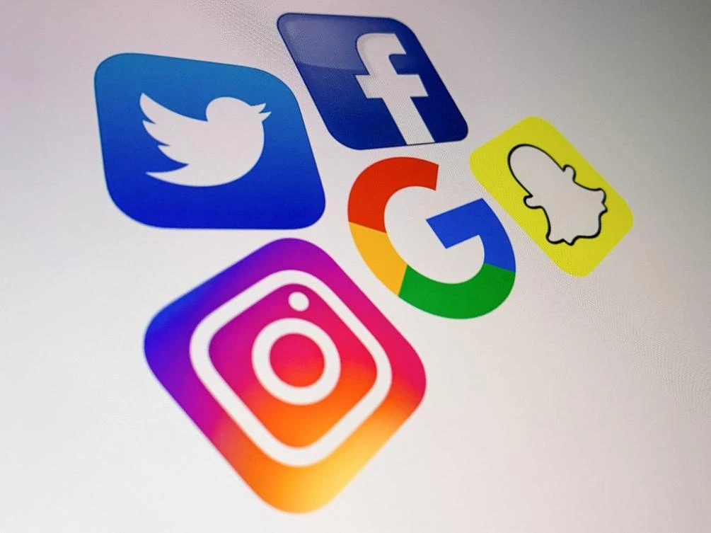 Companies are concerned that the planned rules to address “doxing” could put their staff at risk of criminal investigations. (File/AFP)