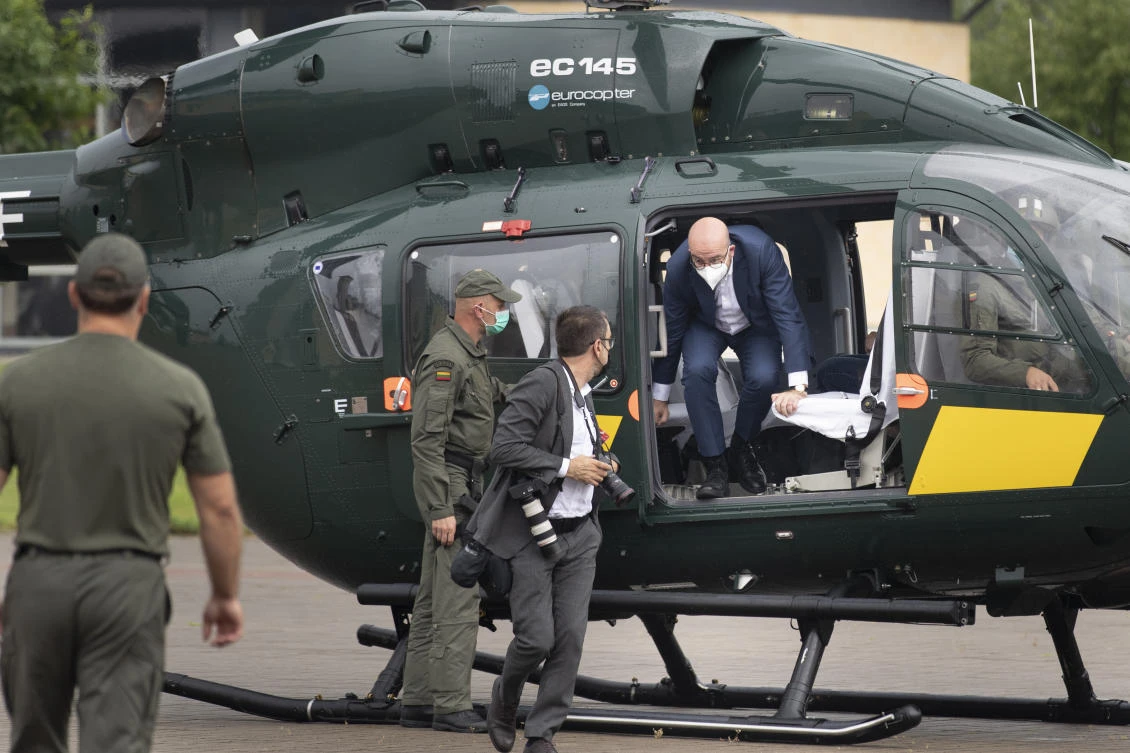 European Council President Charles Michel gets out of a helicopter as he arrives at the Border Guard School near Lithuanian-Belarusian border. (AP)