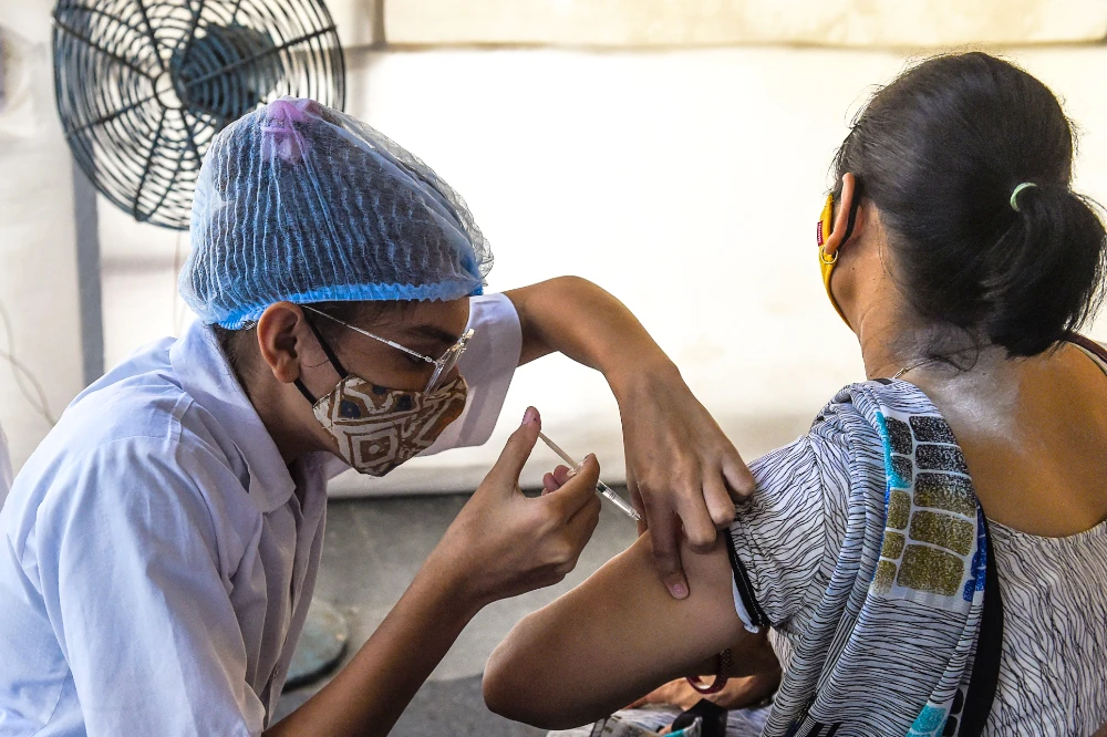 When India started its vaccination campaign in February, the government was the sole agency inoculating people, with jabs free to receive. (AFP)