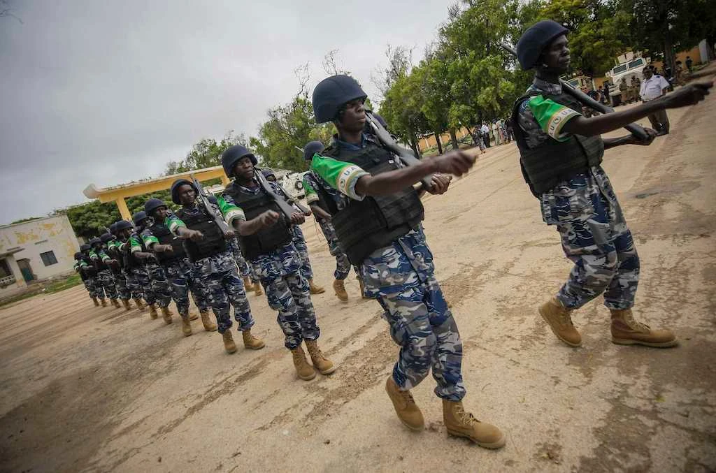 A handout photograph released by the African Union-United Nations Information Support Team shows Ugandan police officers serving with the African Union Mission in Somalia’s first Formed Police Unit (FPU) marching in Mogadishu on Thursday. (Reuters)
