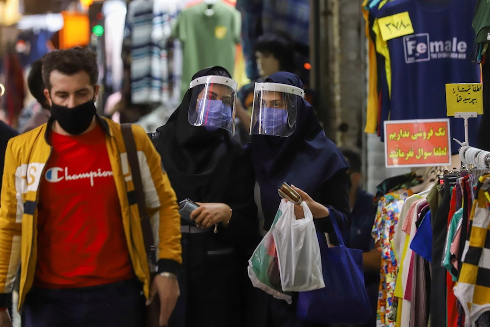 Desperate Iranians flock to Armenia for vaccines