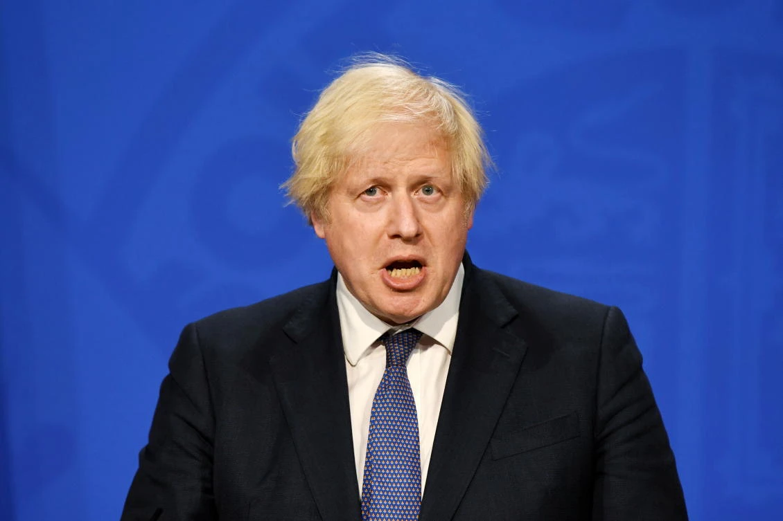 Britain’s Prime Minister Boris Johnson gives an update on relaxing restrictions imposed on the country during COVID-19 pandemic at a news conference inside the Downing Street Briefing Room in London on Monday. (Reuters)