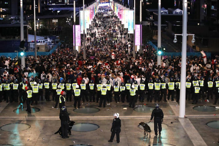 Questions over policing and W.Cup bid after violent Wembley scenes