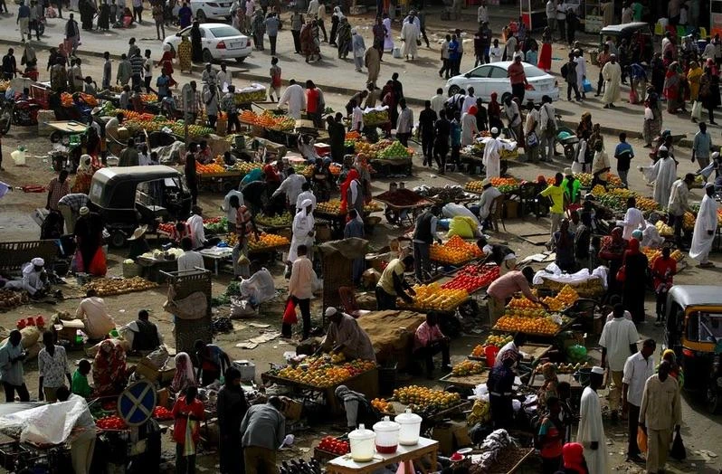 Sudanese shoppers pictured at a bazaar in Khartoum. (Reuters)