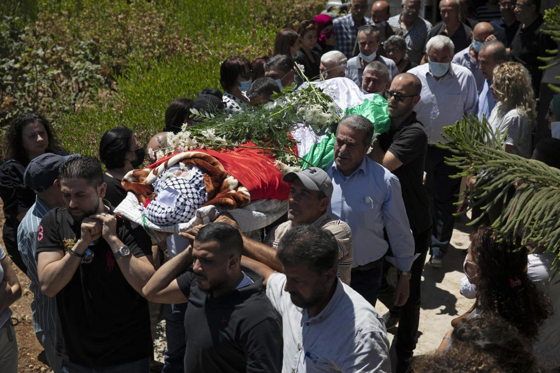 Thousands mourn daughter of jailed Palestinian activist