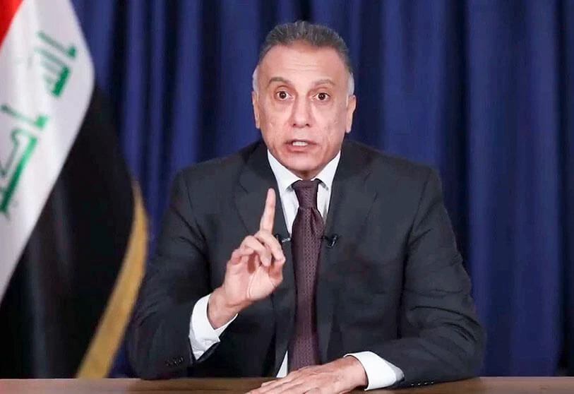 Prime Minister-designate Mustafa al-Kazemi addresses the Iraqi people in a televised speech in the capital Baghdad on April 9, 2020. (AFP)