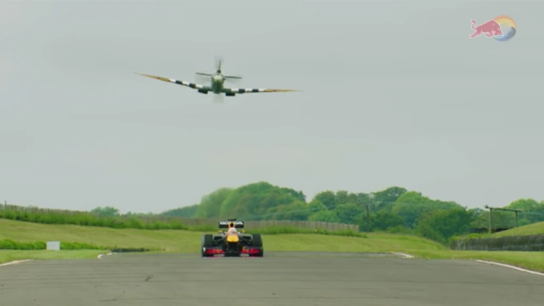 Max Verstappen took on an iconic red London bus and London black cab, and even a common white van, before challenging the legendary Spitfire fighter plane. (Screenshot/Red Bull)