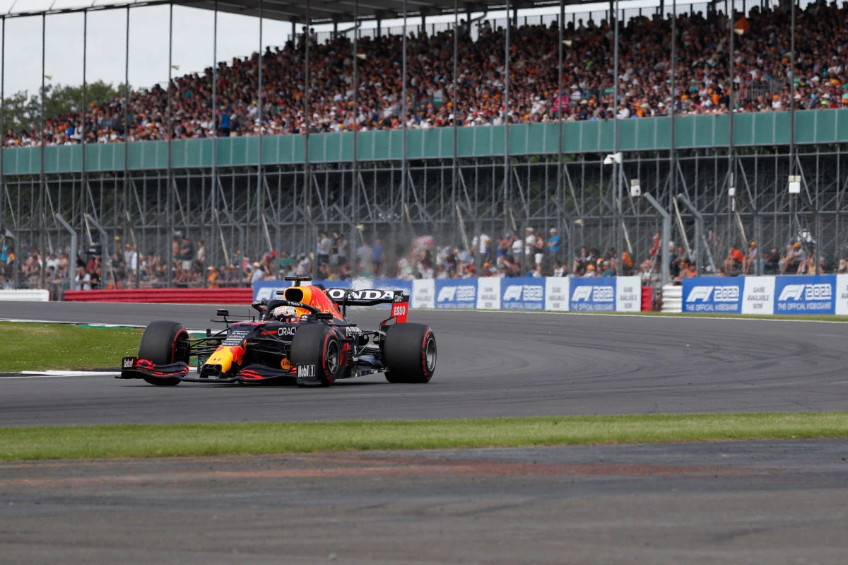 Max Verstappen drives at Luffield Corner during the practice 1 session of the Formula One British Grand Prix on July 16, 2021. (AFP)